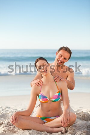 Enamored couple hugging on the beach Stock photo © wavebreak_media