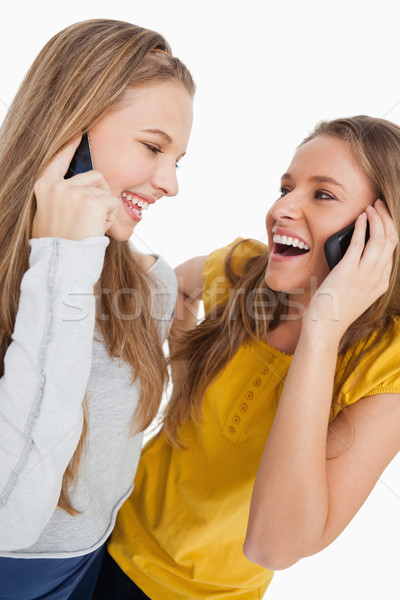 Deux belle élèves rire téléphone [[stock_photo]] © wavebreak_media