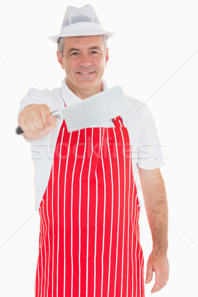 Stock photo: Butcher smiling and holding big meat cleaver