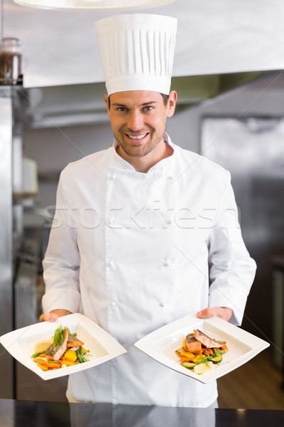 Confident male chef with cooked food in kitchen Stock photo © wavebreak_media