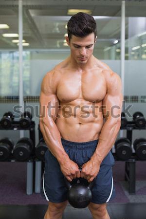 Póló nélkül izmos férfi testmozgás súlyzók fiatal Stock fotó © wavebreak_media
