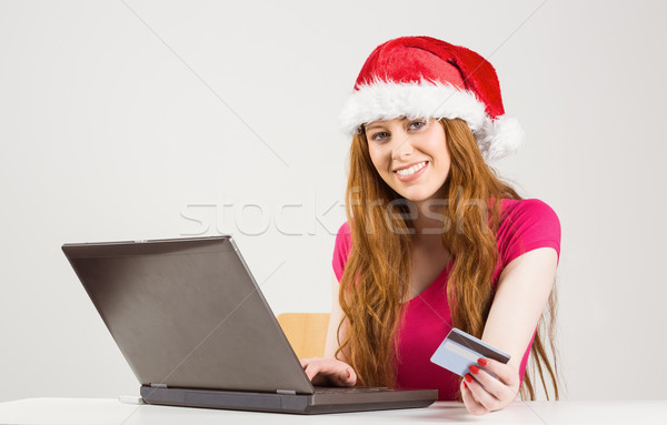 ünnepi vörös hajú nő vásárlás online laptop fehér Stock fotó © wavebreak_media