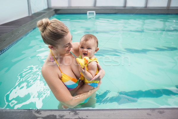 Pretty mother and baby at the swimming pool Stock photo © wavebreak_media