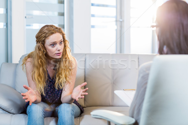 Psicólogo falante deprimido paciente escritório mulher Foto stock © wavebreak_media