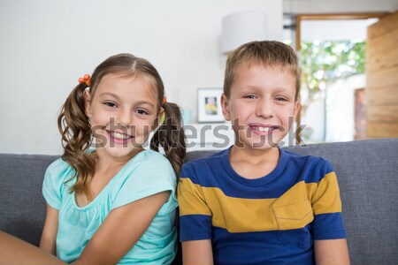 Glücklich Geschwister lächelnd Kamera zusammen home Stock foto © wavebreak_media