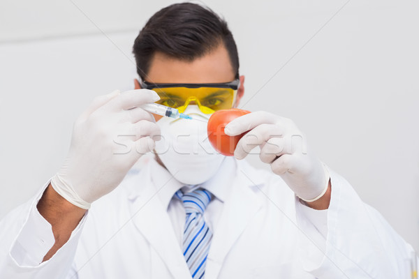 Scientist doing injection to tomato  Stock photo © wavebreak_media