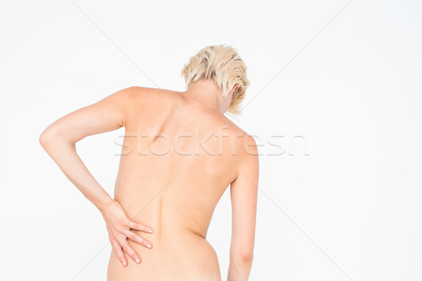 Beautiful woman with back pain  Stock photo © wavebreak_media