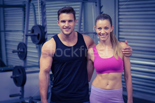 Stock photo: Muscular couple looking at the camera