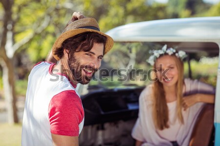 Young couple holding hands against van Stock photo © wavebreak_media