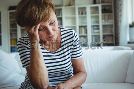 Tense senior man sitting in living room Stock photo © wavebreak_media