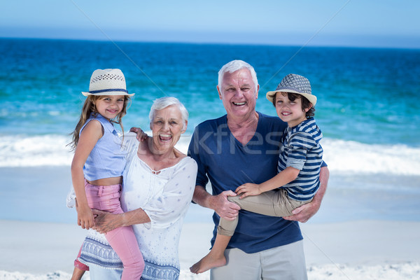 Heureux grands-parents Retour enfants plage [[stock_photo]] © wavebreak_media