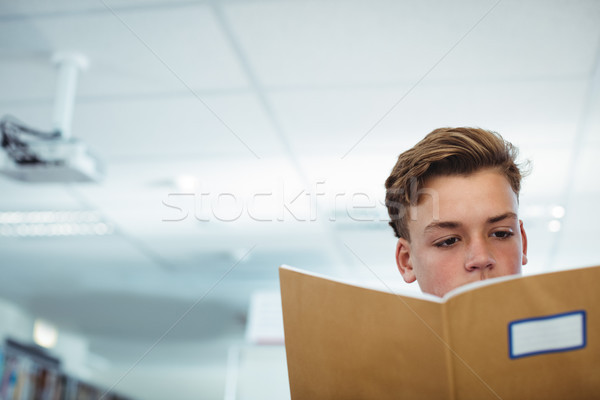 Schooljongen lezing boek bibliotheek school kind Stockfoto © wavebreak_media