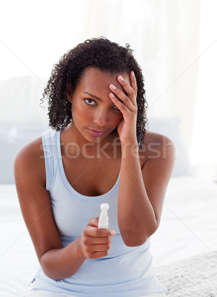 Diconcerted woman finding out results of a pregnancy test  Stock photo © wavebreak_media