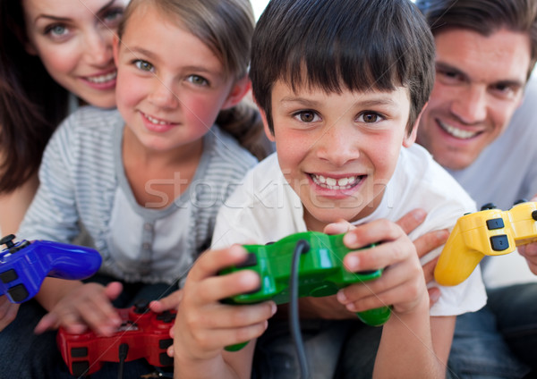 Stockfoto: Opgewonden · familie · spelen · video · games · woonkamer · man