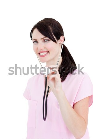 Stock photo: Radiant female doctor showing a stethoscope 