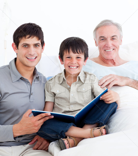 Laughing father and son visiting grandfather  Stock photo © wavebreak_media