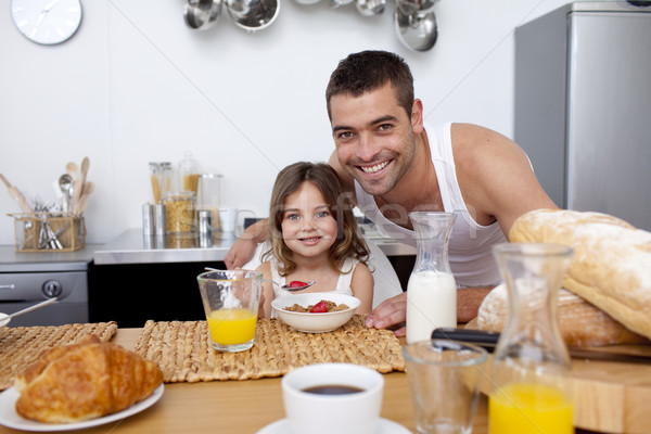 Daughter having breakfast with her father Stock photo © wavebreak_media