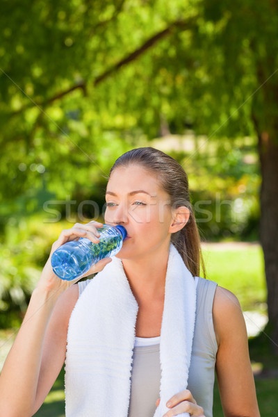 Woman drinking water after the gym Stock photo © wavebreak_media