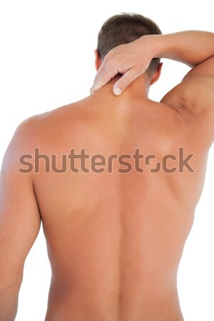 Back view of female with pain in her neck against a white background Stock photo © wavebreak_media