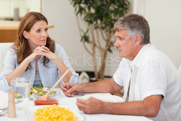 Family sitting at dinner table together Stock photo © wavebreak_media