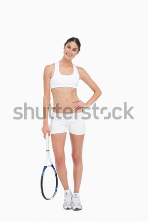 Mince brunette posant raquette de tennis blanche main [[stock_photo]] © wavebreak_media