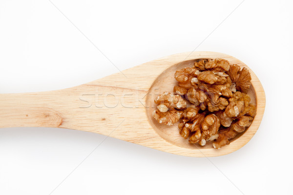 Cuchara de madera nueces blanco fondo desayuno comer Foto stock © wavebreak_media