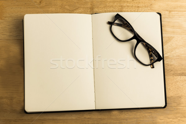 Okulary do czytania notebooka biurko pracy Zdjęcia stock © wavebreak_media