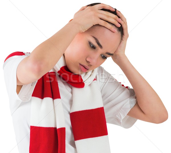 Disappointed football fan looking down Stock photo © wavebreak_media