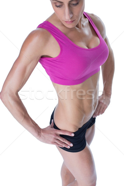 Homme bodybuilder posant rose sport Soutien-gorge [[stock_photo]] © wavebreak_media