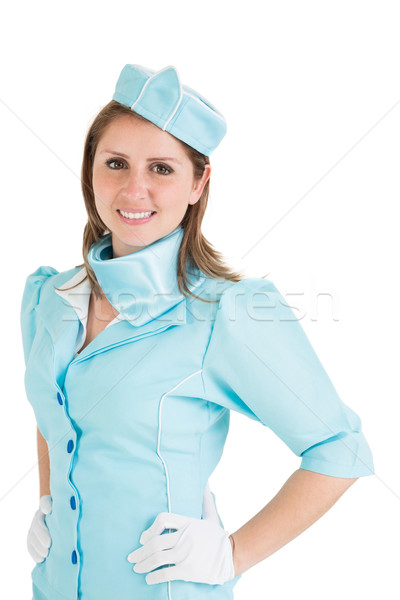 Portrait of a beautiful stewardess dressed in blue uniform Stock photo © wavebreak_media