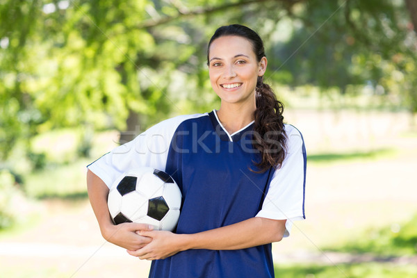 Csinos futballista mosolyog kamera napos idő nő Stock fotó © wavebreak_media