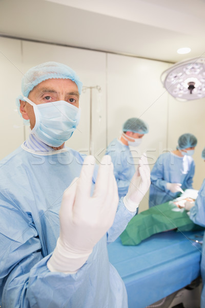 Medical students practicing surgery on model Stock photo © wavebreak_media