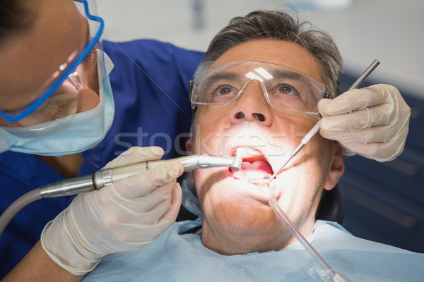 Fogorvos megvizsgál beteg szerszámok fény fogászati Stock fotó © wavebreak_media