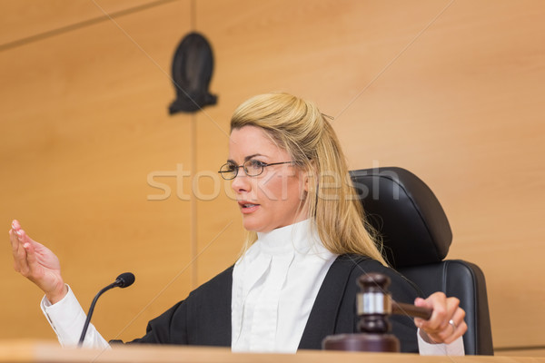 Stock photo: Stern judge speaking to the court