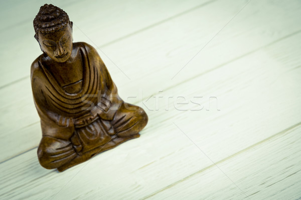 Buddha statue on a table Stock photo © wavebreak_media