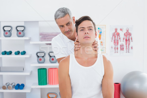 Arzt junger Mann Hals medizinischen Büro Stock foto © wavebreak_media