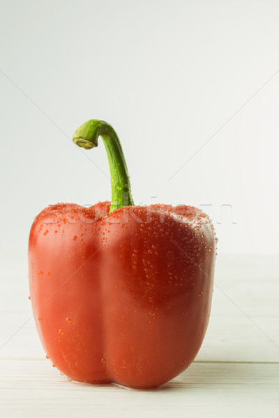 Stock photo: Red pepper on chopping board