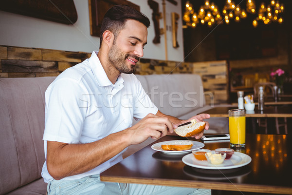 Stockfoto: Jonge · man · boter · toast · cafe · man · brood