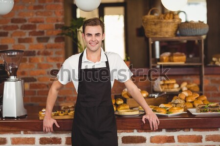 Pretty customer making a mobile payment Stock photo © wavebreak_media