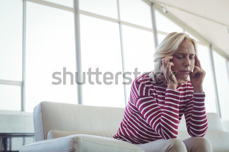 Depressed entrepreneur sitting on sofa Stock photo © wavebreak_media