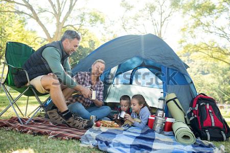 Portrait of couple relaxing in tent Stock photo © wavebreak_media