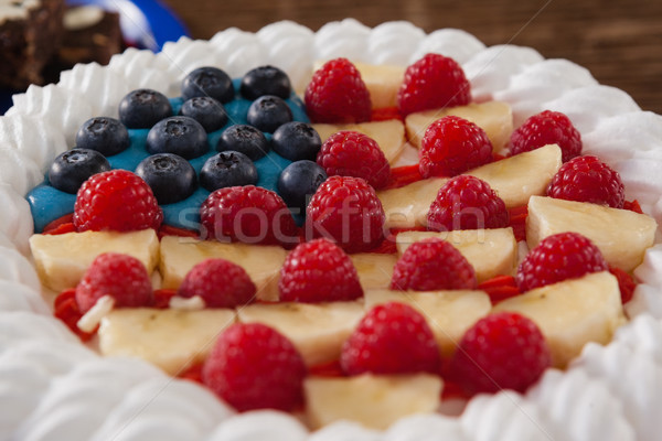 Fruitcake served in plate on wooden table Stock photo © wavebreak_media