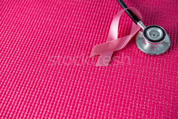 High angle view of stethoscope by pink Breast Cancer Awareness ribbon Stock photo © wavebreak_media