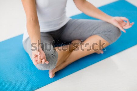 Vrouw lotus pose afbeelding fitness studio Stockfoto © wavebreak_media