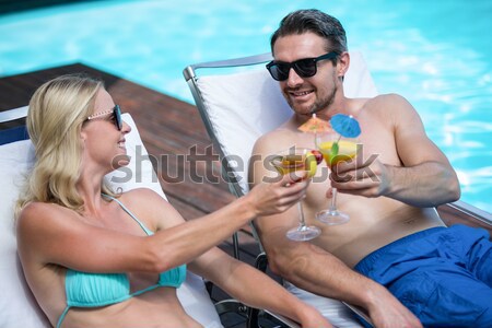 Couple relaxing on deckchairs Stock photo © wavebreak_media