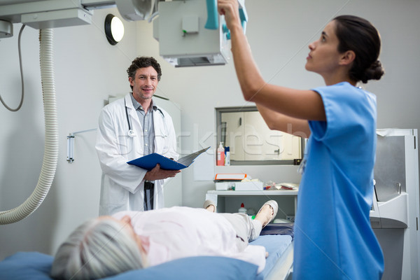 Doctors performing a x-ray test on patient chest Stock photo © wavebreak_media