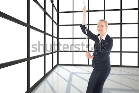 Hermosa mujer de negocios doblado armas jóvenes negocios Foto stock © wavebreak_media