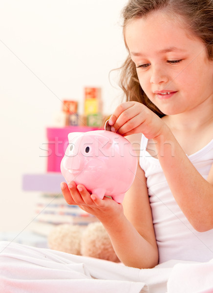 Aranyos kislány takarékosság pénz persely ül Stock fotó © wavebreak_media