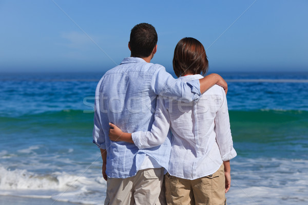 Enamored couple looking at the sea Stock photo © wavebreak_media