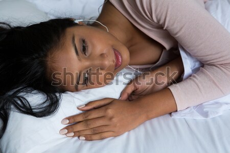 Happy father napping with baby son on couch Stock photo © wavebreak_media